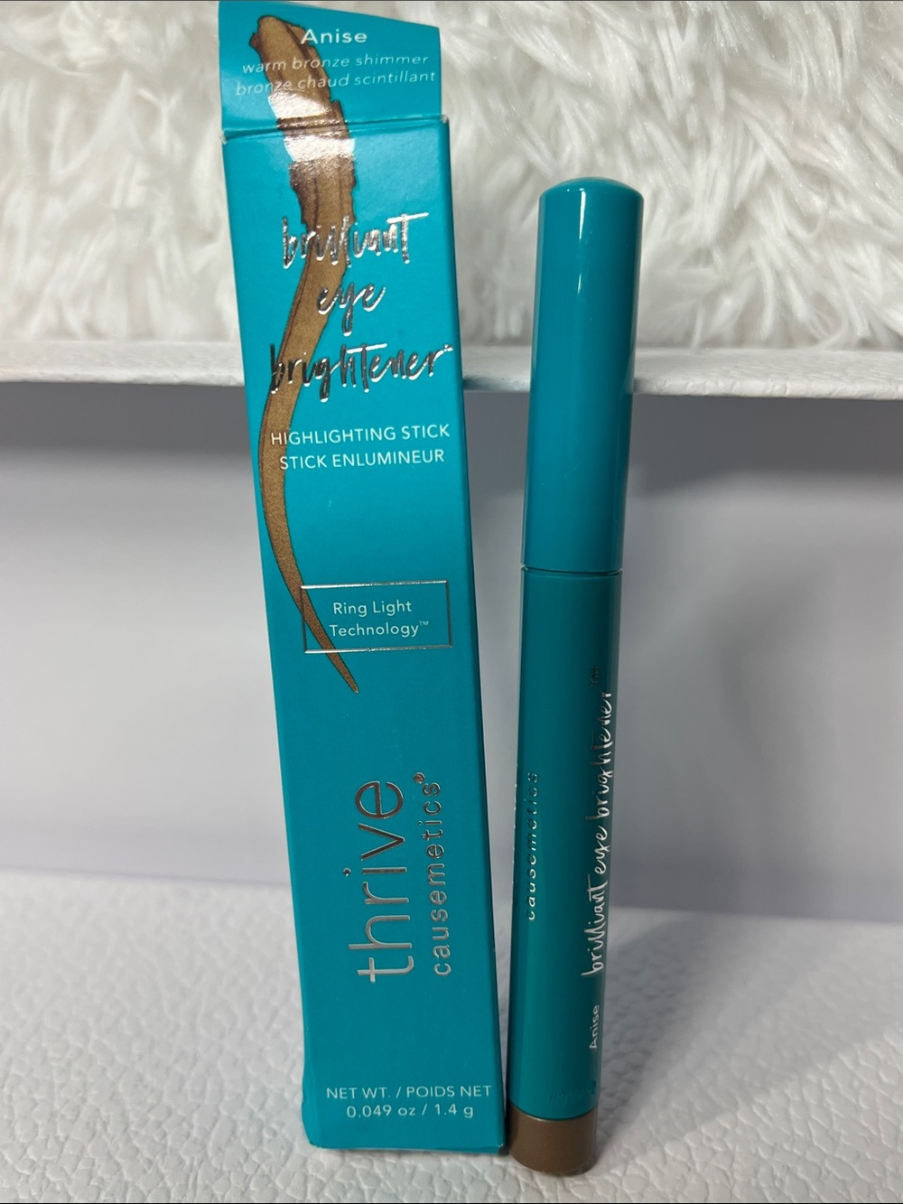 Thrive Causemetics: Brilliant eye brightener highlighting eyeshadow stick Anise